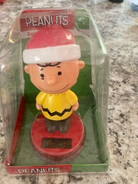 Peanuts solar bobble headCharlie Brown Figure in with Red Santa Hat